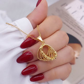 نیمست گردنبند وگوشواره البرنادوحلقه ای برندNG مشابه طلا