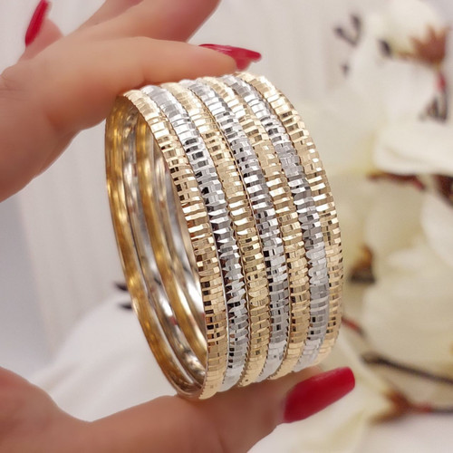 پک النگوترکیبی زنانه طلاروس اصل.تراشدار براق رنگ ثابت