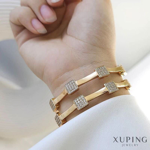 دستبند جواهری لوکس مجلسی طرح طلا زنانه برند معتبر ژوپینگ