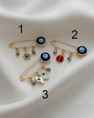 سنجاق سینه چشم نظر نوزاد کاملا طرح طلا.جنس برنزی آبکاری قوی طلا