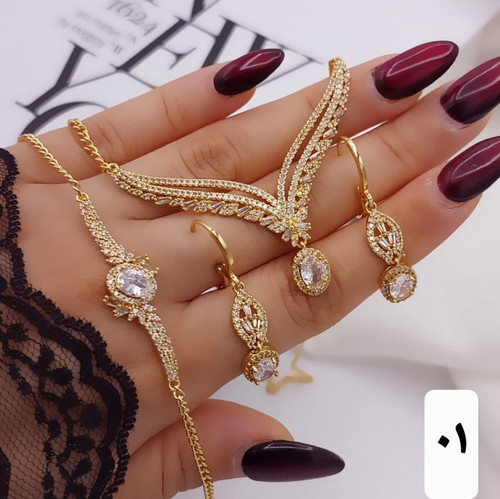 سرویس جواهری مجلسی جدیدطرح طلا رنگثابت همراه کارت ضمانت